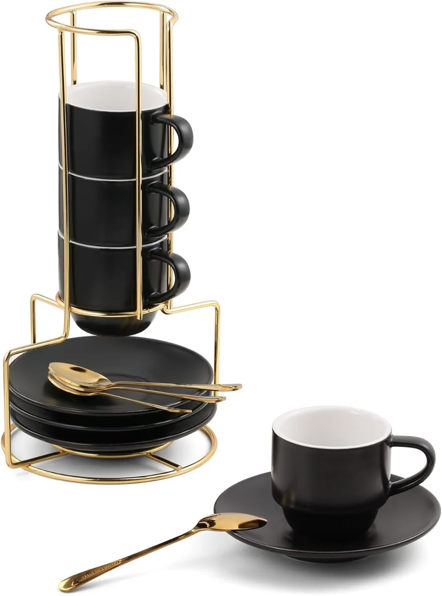 Aesthetic coffee bar accessories displayed on a kitchen countertop including shelf organizer, frother, warmer, mugs, flatware, and pitcher