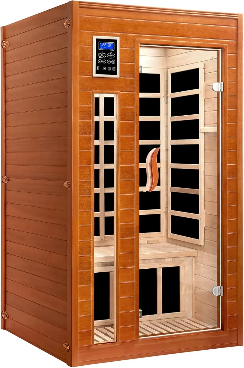 Person relaxing in a brown 1-2 person infrared sauna with red light therapy and Bluetooth speakers