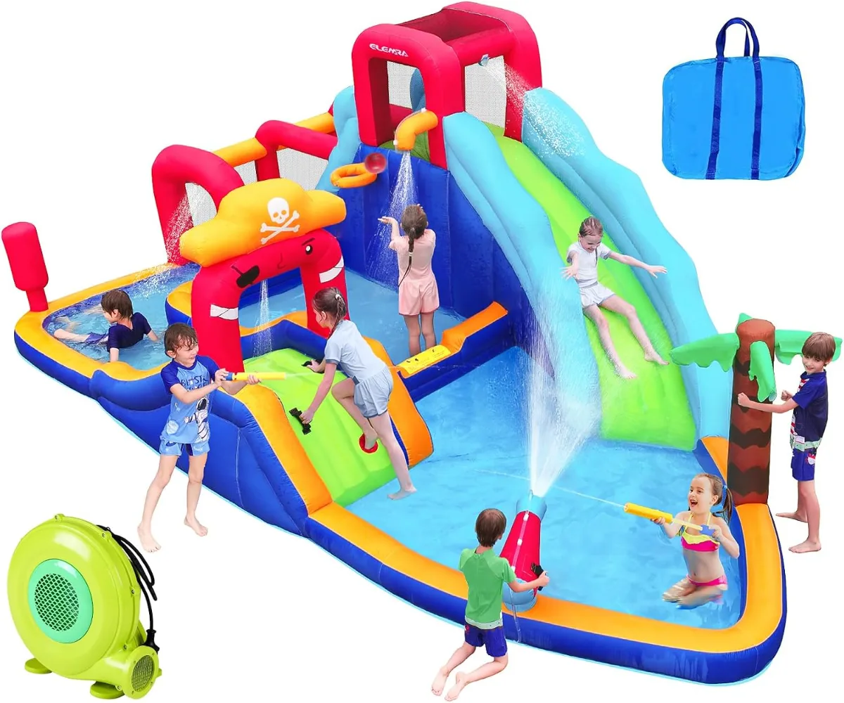 Kids laughing while sliding down a colorful inflatable water slide with splash pool and blower running in a sunny backyard