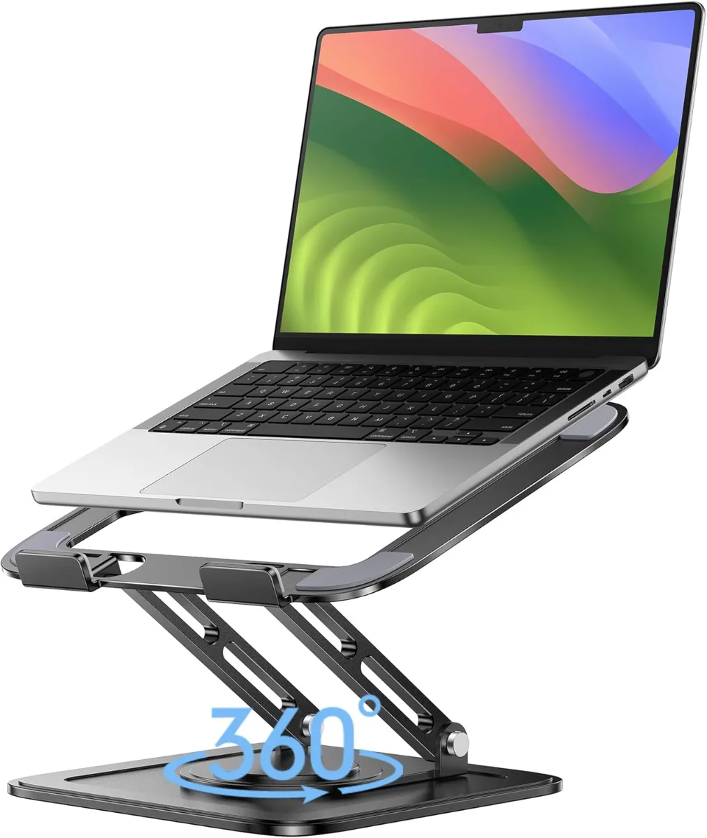 A tidy desk setup featuring the best laptop stand under 30 choices in silver, black, and aluminum finishes