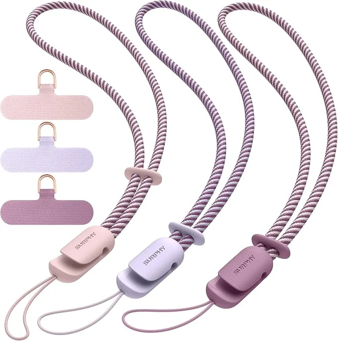 A flat lay of cute phone accessories that look expensive, featuring adjustable lanyards, pearl‑beaded chains, magnetic tethers, two‑tone braided wristlets, and MagSafe grips.