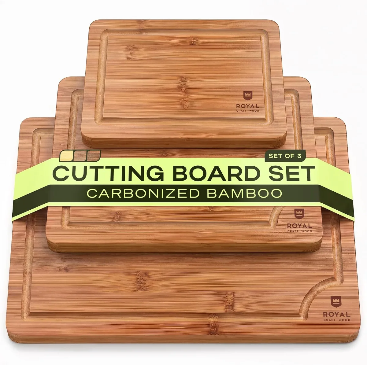 Small kitchen gadgets that look expensive arranged on a sleek countertop: chopper, gold scissors, bamboo board, aqua waffle maker and clear hobnail glasses